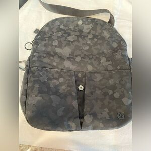 Lululemon Black Crossbody Bag with the shopping bag